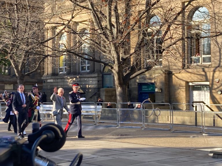 King Charles walking into Leeds Art Gallery