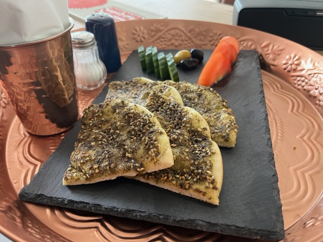 Zaatar manoushe on black board