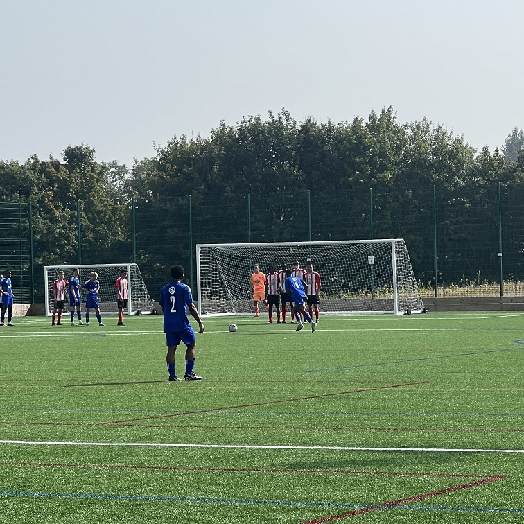 Halifax academy player taking free kick