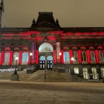 Leeds Museum lit with red