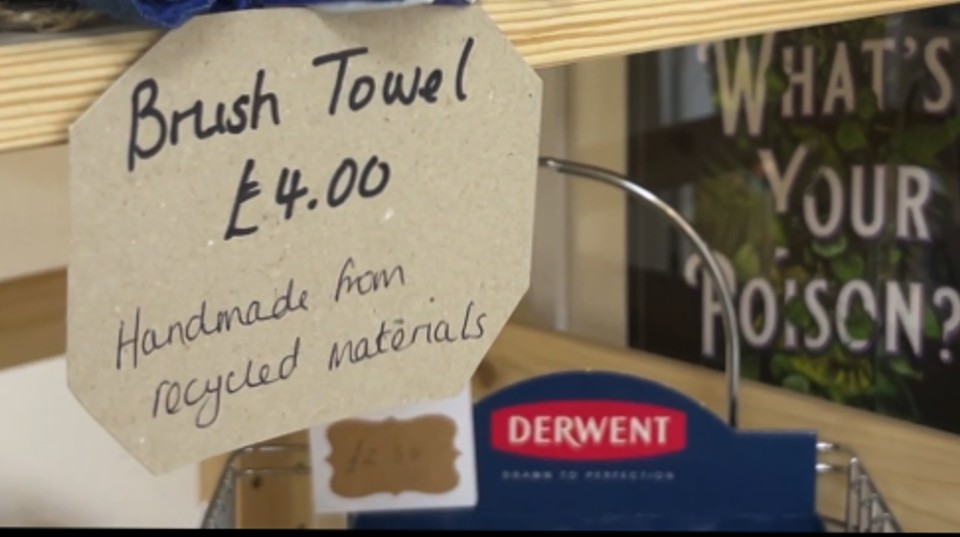 Recycled materials sign inside the Beam Works shop