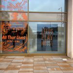 The front of Leeds Play House and the entrance to the exhibition