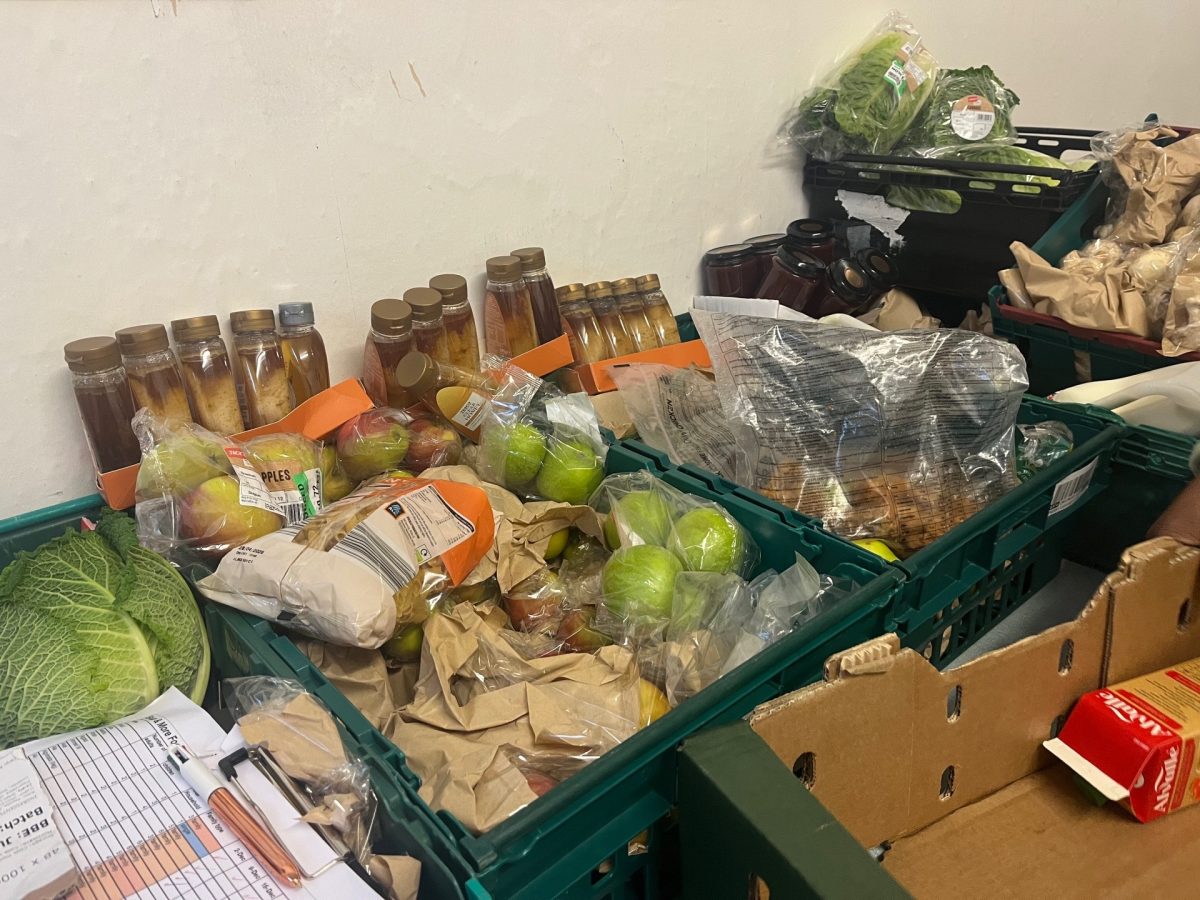 A box full of a variety of food being prepared to give to foodbank users