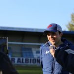 Head coach rob mitchell being interviewed