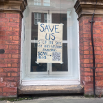 Poster which depicts the attempt to keep Aire Street Workshops open.