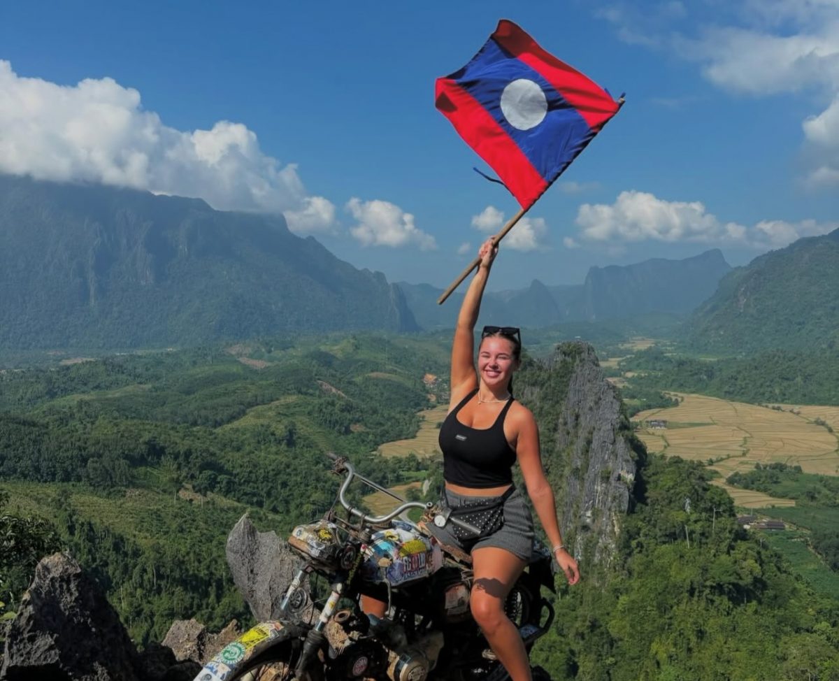 Natasha Moore, Leeds backpacker with Laos flag