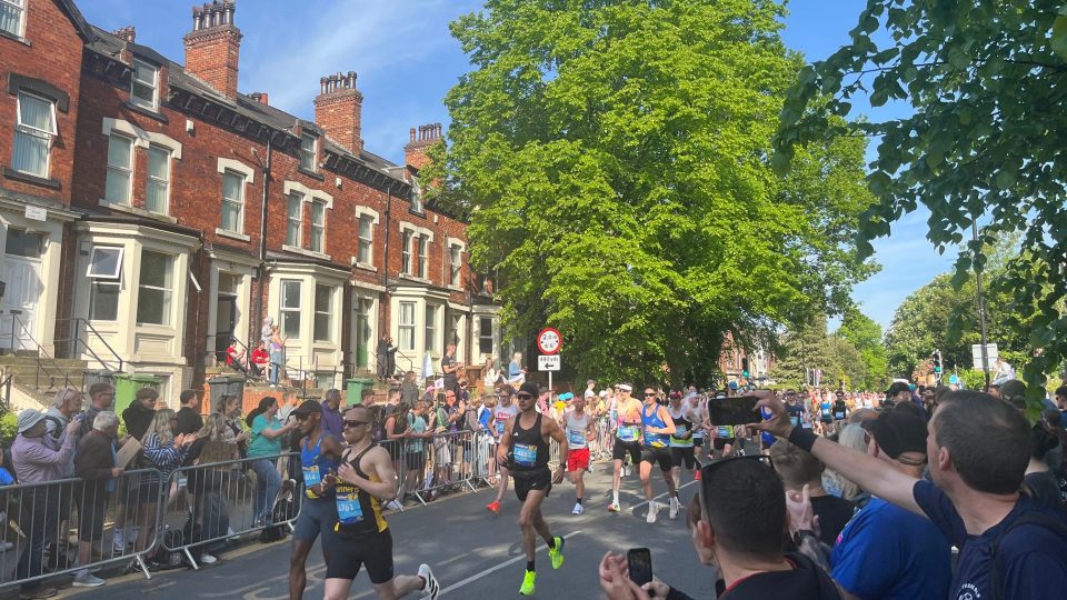 The first of many racers bolt down Cardigan Road