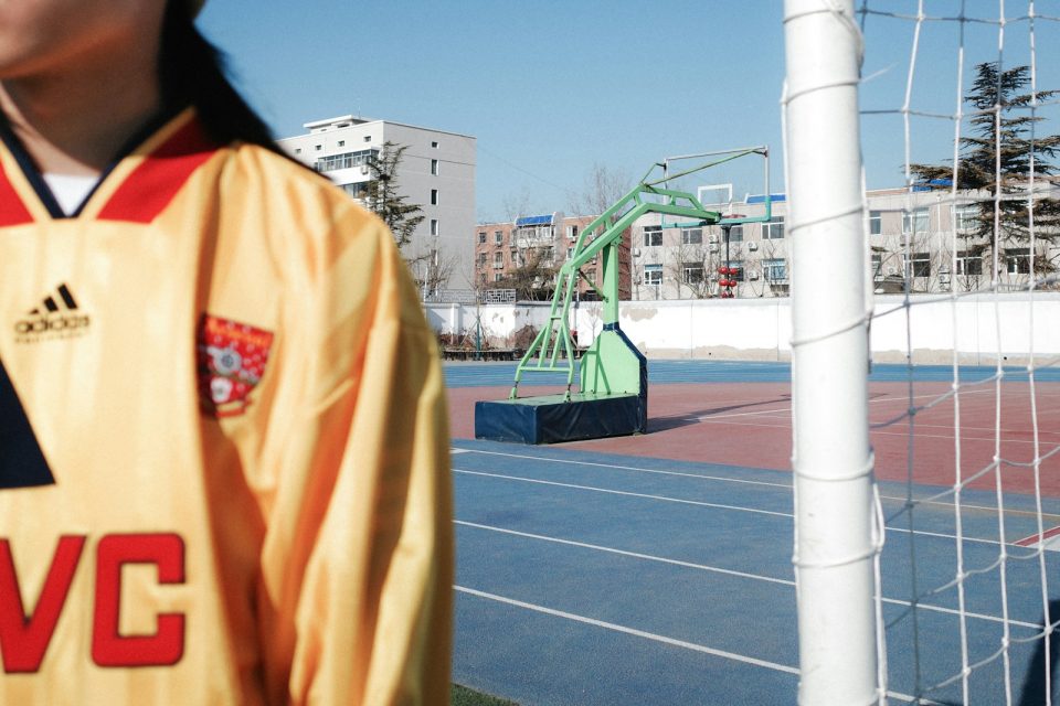 a soccer goalie's jersey on a soccer field