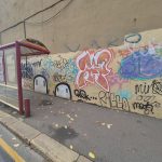 A wall with graffiti on it