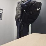 A recreation of a shoplifter walking away with their stolen hoodie.