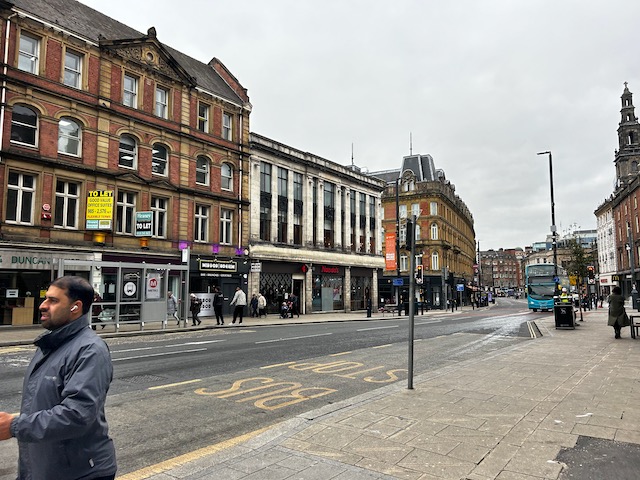 A wide shot of Leeds city street
