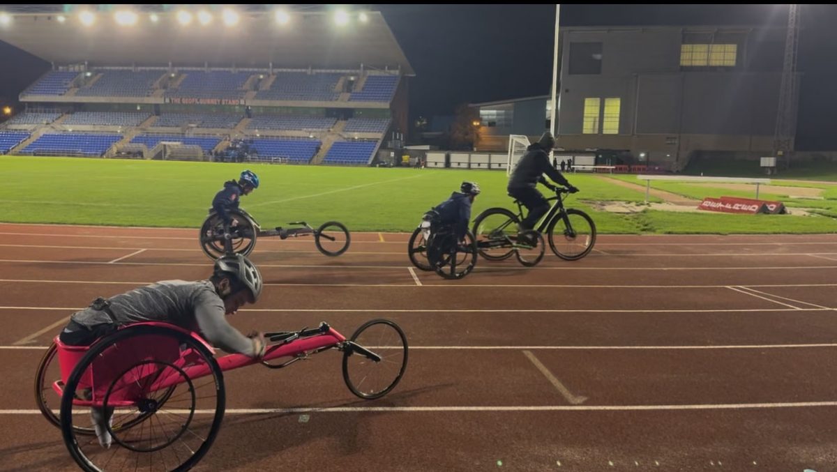 The image shows wheelchair racing