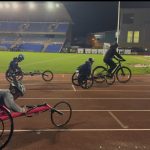 The image shows wheelchair racing