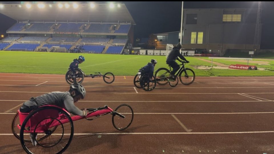 The image shows wheelchair racing