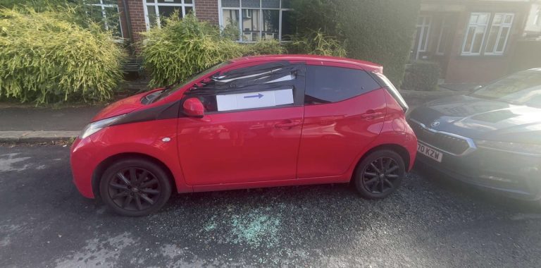 car with window smashed